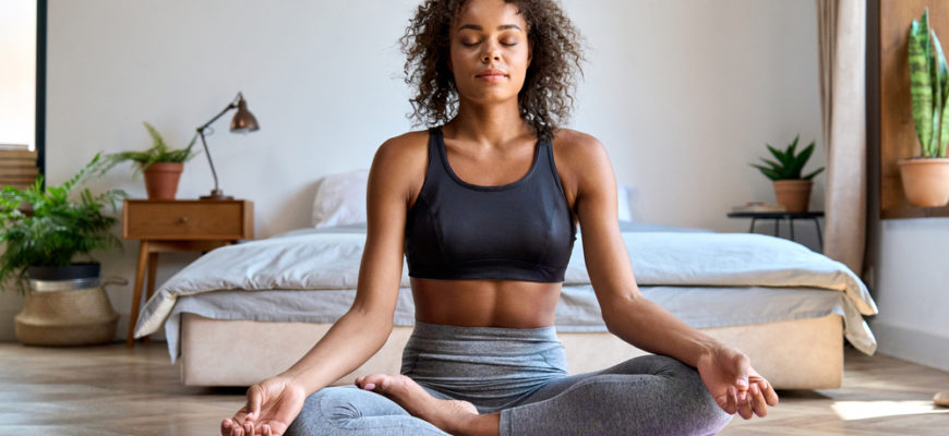 Young,Calm,Fit,Healthy,African,American,Woman,Wearing,Sportswear,Sitting